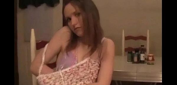  Cute teen Kitty reading a magazine and flashing her panties